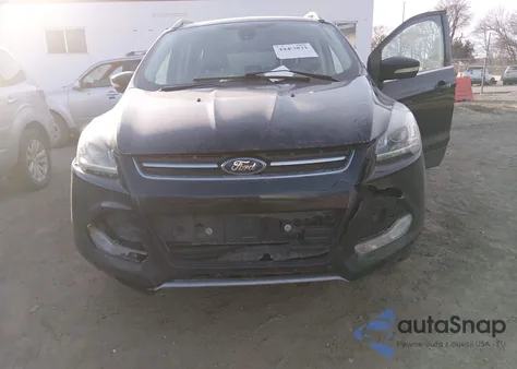 2014 Ford Escape Titanium z USA, uszkodzony, nr VIN 1FMCU9JX4EUB45684